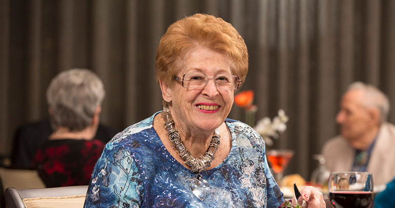 Senior woman enjoying a meal